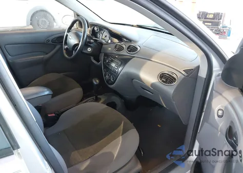 2004 Ford Focus Se z USA, uszkodzony, nr VIN 1FAHP34394W146524